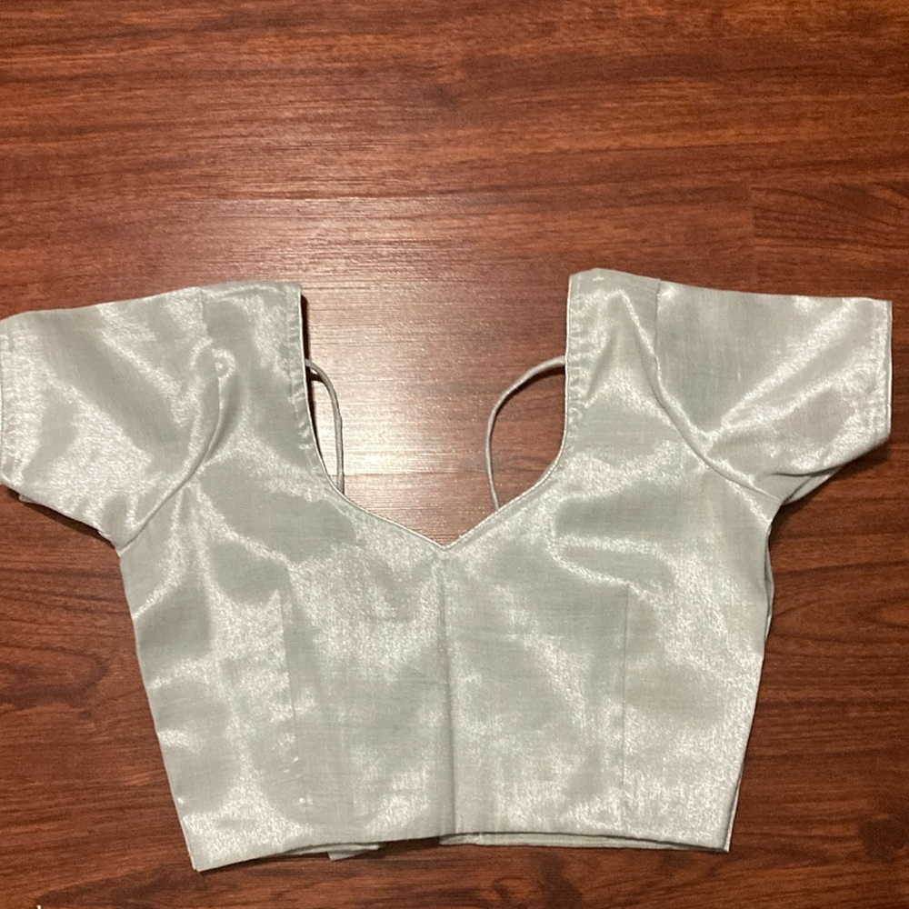 Brand new silver blouse